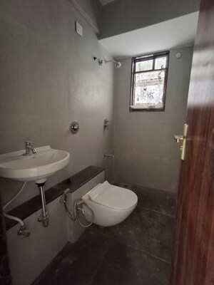 Bathroom in 3 BHK Apartment at Tendulkar Mangesh Residency, Dadar West – for Sale