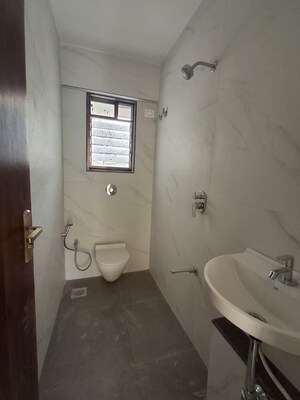Bathroom in 3 BHK Apartment at Tendulkar Mangesh Residency, Dadar West – for Sale