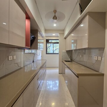 Kitchen in 3 BHK Apartment at Rustomjee Seasons Bandra East, Kala Nagar – for Rent