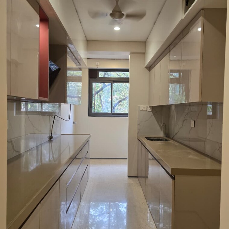 Kitchen, rustomjee-seasons-bandra-east 3 Bedroom 1004 Sq.Ft. Apartment In Kala Nagar Mumbai 9718761