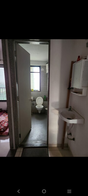 Bathroom in 1.5 BHK Apartment at Sun Rising Homes, Jagatpur – for Rent