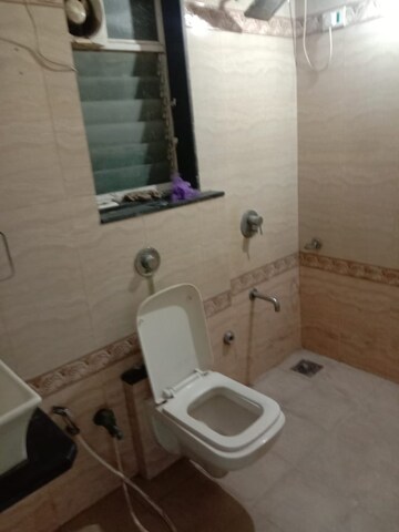 Bathroom in 3 BHK Apartment at K Raheja Palm Spring, Malad West – for Rent