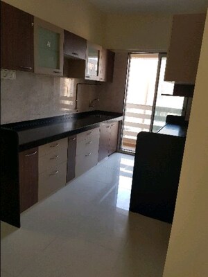 Kitchen in 2 BHK Apartment at K Raheja Palm Court, Malad West – for Rent