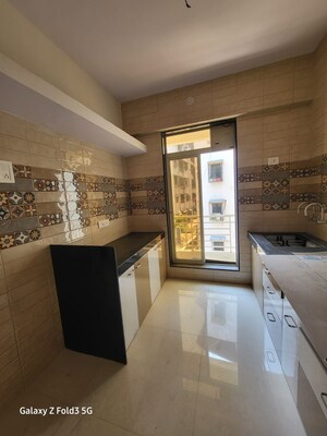 Living Room in 1 BHK Apartment at Lodha Amara Tower 23, Kolshet Road – for Rent