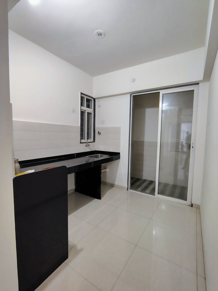 Kitchen, saheel-itrend-life 2 Bedroom 820 Sq.Ft. Apartment In Wakad Pune 9719101