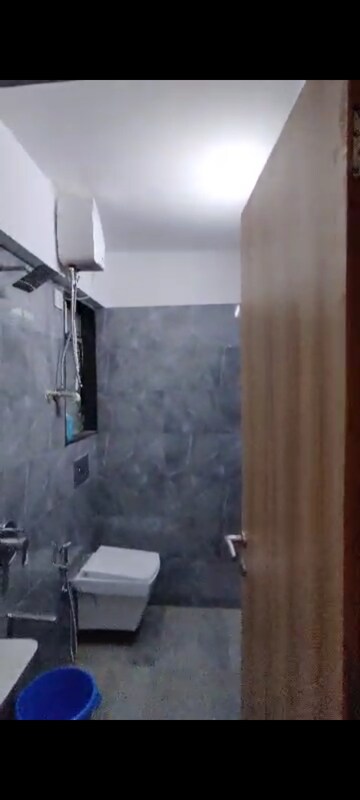 Bathroom in 2 BHK Apartment at Pratham ARC Aura, Andheri West – for Rent