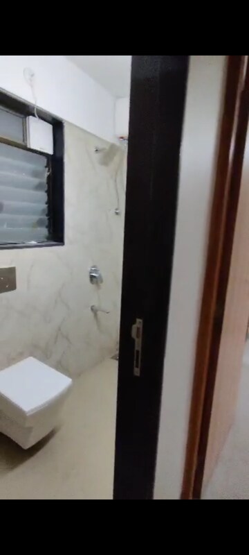 Bathroom in 2 BHK Apartment at Pratham ARC Aura, Andheri West – for Rent