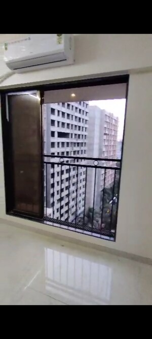 Room in 2 BHK Apartment at Pratham ARC Aura, Andheri West – for Rent
