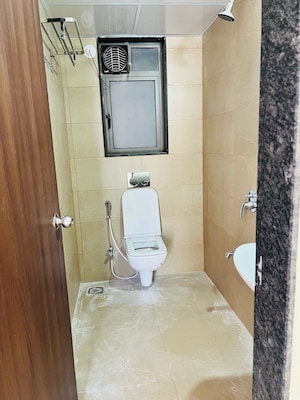 Bathroom in 2 BHK Apartment at Runwal Eirene, Balkum Pada – for Rent