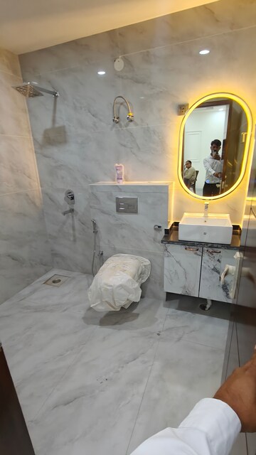 Bathroom in 3.5 BHK Builder Floor at DLF Centre Point, Sector 11 – for Sale