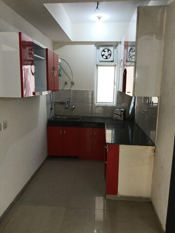 Kitchen in 2 BHK Apartment at Ajnara Homes, Sector 16b Greater Noida – for Rent