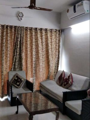 Living Room in 2 BHK Apartment at Rustomjee Urbania Azziano, Thane West – for Rent