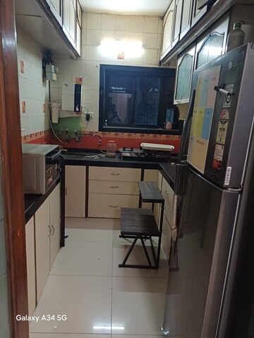 Kitchen in 3 BHK Apartment at Kopar Khairane Sector 14 – for Rent