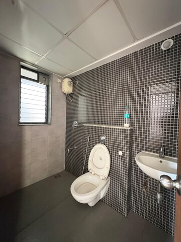 Bathroom in 2 BHK Apartment at Lodha Lakeshore Greens, Dombivli East – for Rent