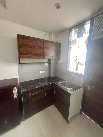 Kitchen in 1 RK Apartment at Dlf Cyber City, Sector 24 – for Rent