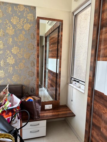 Living Room in 2 BHK Apartment at Vijay Galaxy, Waghbil – for Rent