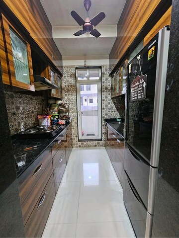 Kitchen in 2 BHK Apartment at Vasant Fiona, Pokhran Road No Two – for Rent