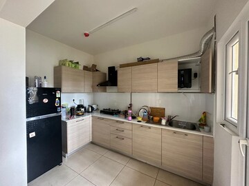 Kitchen in 2 BHK Apartment at Bhartiya Nikoo Homes, Thanisandra Main Road – for Rent