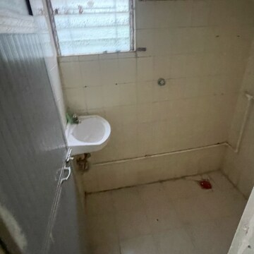 Bathroom in 1 BHK Apartment at Rutu Enclave, Kasarvadavali – for Sale