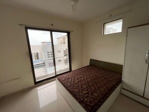 Bedroom in 2 BHK Apartment at Swastik Windsor Heights, Kharghar – for Rent