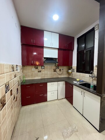 Kitchen in 3 BHK Builder Floor at Shakti Khand iv – for Sale