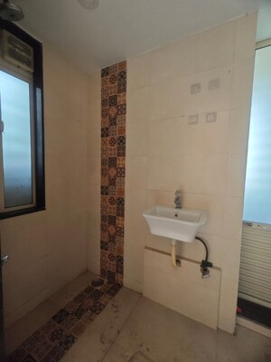 Bathroom in 2 BHK Apartment at Shakuntala Shelters, Chembur – for Rent