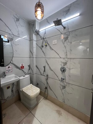 Bathroom in 2 BHK Builder Floor at Dwarka Mor – for Sale