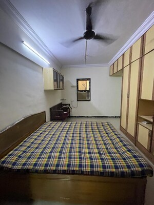 Master Bedroom in 2 BHK Apartment at Manavsthal Heights, Andheri East – for Sale
