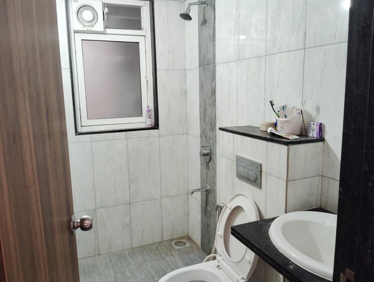 Bathroom, kolte-patil-life-republic-oro-avenue 2 Bedroom 720 Sq.Ft. Apartment In Hinjewadi Pune 9721120