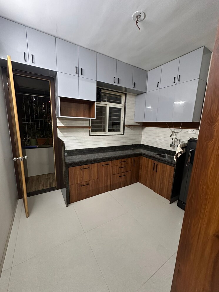 Kitchen, sumana-green-basil 2 Bedroom 758 Sq.Ft. Apartment In Baner Pune 9721174