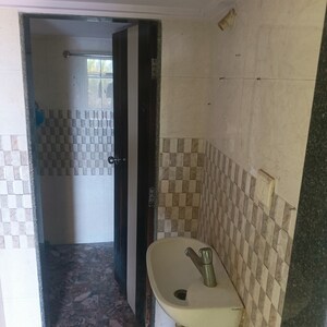 Bathroom in 1 BHK Apartment at Orchid Galaxy Apartments, Vasai East – for Sale