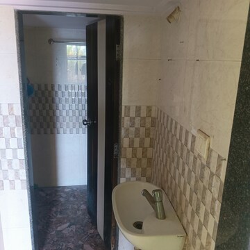 Bathroom in 1 BHK Apartment at Orchid Galaxy Apartments, Vasai East – for Sale