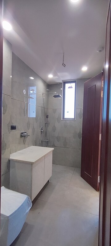 Bathroom in 4 BHK Apartment at Ansal Crown Heights, Sector 80 – for Rent