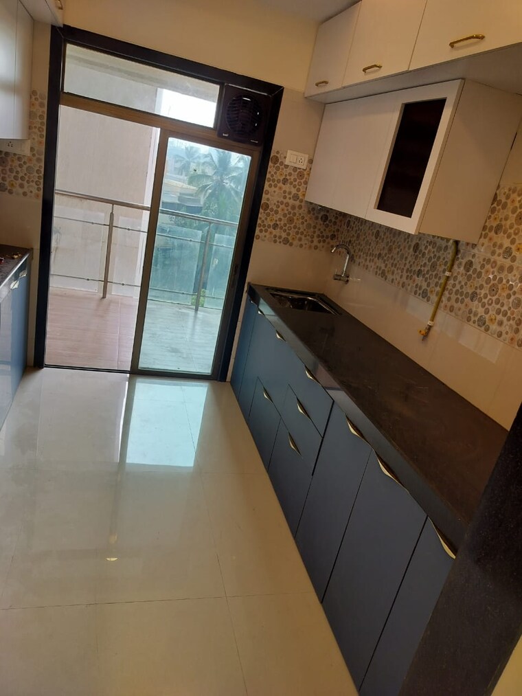 Kitchen, anmol-eleganzia-royale 3 Bedroom 1100 Sq.Ft. Apartment In Andheri West Mumbai 9721443