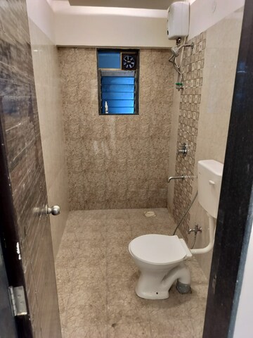 Bathroom in 3 BHK Apartment at Anmol Eleganzia Royale, Andheri West – for Rent