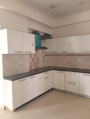 Kitchen in 3 BHK Apartment at Saviour Green Arch, Tech Zone 4 Greater Noida – for Sale