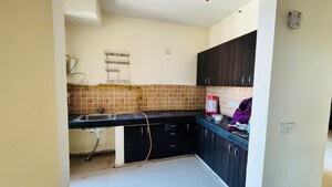 Kitchen in 2 BHK Apartment at Mahagun Mywoods, Sector 16c Greater Noida – for Rent