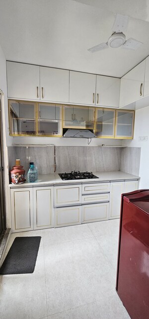 Kitchen in 2 BHK Apartment at Pride World City Long Island, Charholi Budruk – for Rent