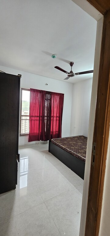Bedroom in 2 BHK Apartment at Pride World City Long Island, Charholi Budruk – for Rent