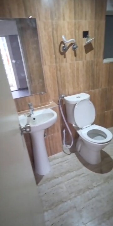 Bathroom in 2 BHK Apartment at Mahagun Mantra I, Sector 10 Greater Noida – for Rent