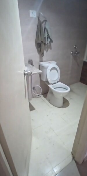 Bathroom in 2 BHK Apartment at Mahagun Mantra I, Sector 10 Greater Noida – for Rent