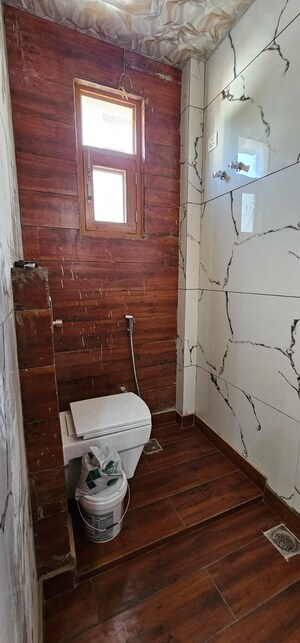 Bathroom in 4 BHK Builder Floor at Gms Road – for Sale