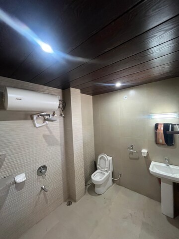 Bathroom in 3 BHK Builder Floor at Sahastradhara Road – for Sale