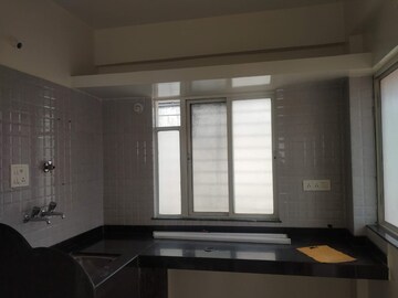 Kitchen in 1 BHK Apartment at Varanasi Society, Warje – for Sale