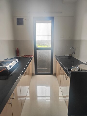 Kitchen in 1 BHK Apartment at Shapoorji Pallonji Joyville, Virar West – for Rent