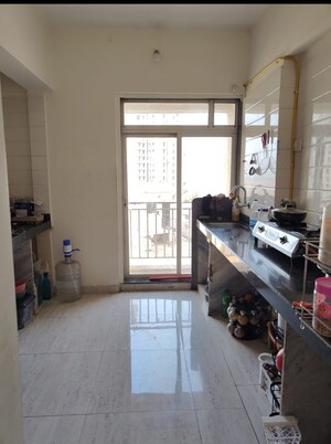 Kitchen in 2 BHK Apartment at Yashraj Park CHS, Kasarvadavali – for Rent