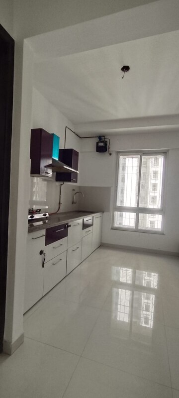 Kitchen in 1 BHK Apartment at Puranik Rumah Bali, Ghodbunder Road – for Rent