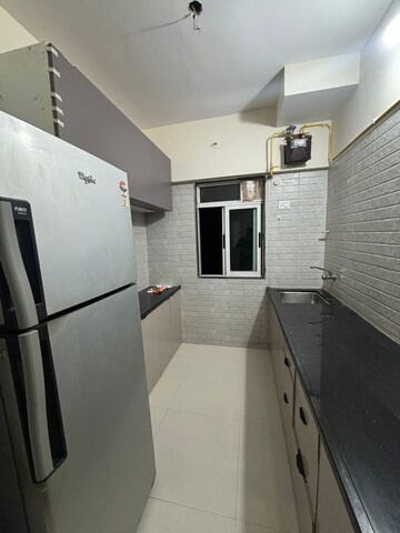 Kitchen in 2 BHK Apartment at Vihang Valley Phase 2, Kasarvadavali – for Rent