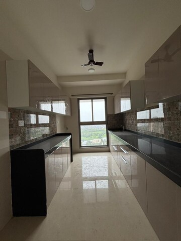 Kitchen in 2 BHK Apartment at Rajesh Raj Infinia, Malad West – for Rent