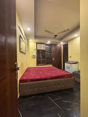 Bedroom in 2 BHK Builder Floor at Palm Residency Chhatarpur, Chattarpur – for Rent